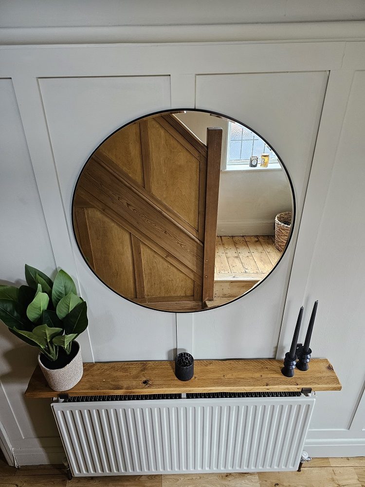 large round black framed mirror for hall