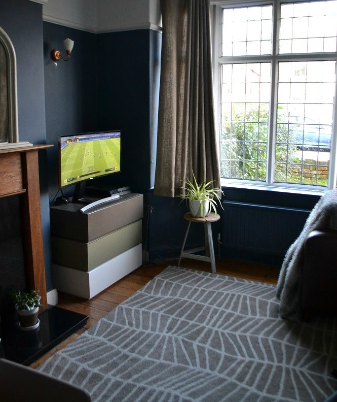 Wool rug on floorboards