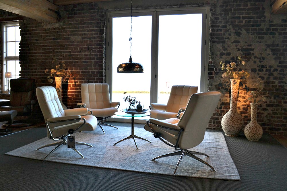 Ekornes Cream Leather Chairs